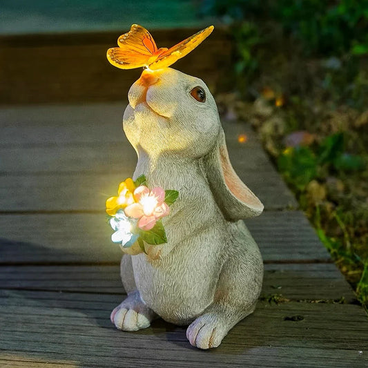 Solarny królik ogrodowy z LED i motylem, dekoracyjna figurka